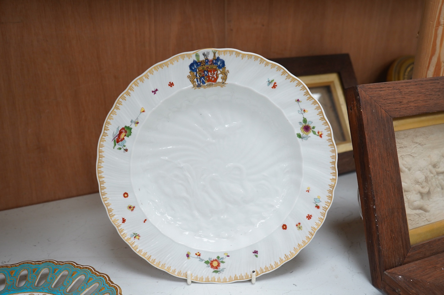 Five mixed 19th and 20th century armorial plates, including Royal Worcester, Spode and a Nelson Rockefeller collectors plate, largest 27cm diameter. Condition - two have gilded bands worn and one scratches to green glazi